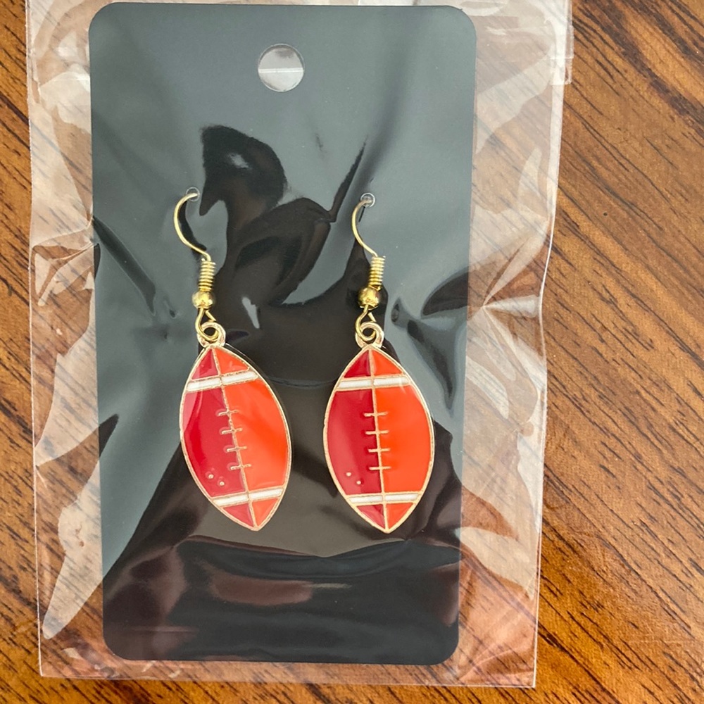 “ Football” earrings.